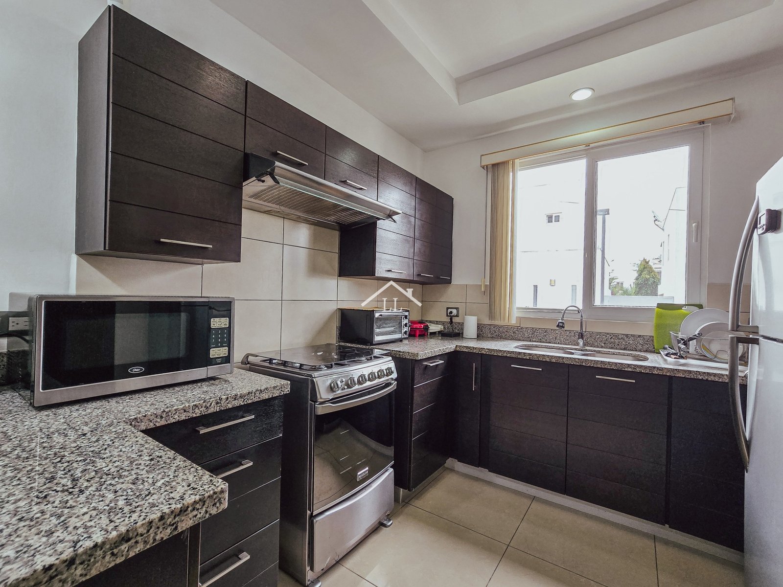 Venta de Hermosa Casa de Dos Pisos en Condominio Palmira de Santo Domingo